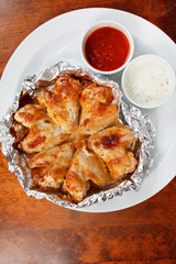 Chicken wings with sauce