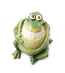 Fototapeta premium Smiling plastic frog isolated on the white background.