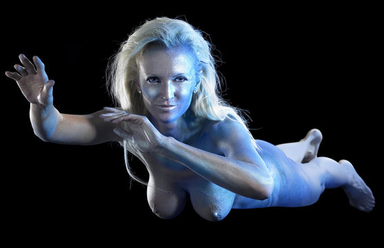 blue bodypainted woman and fabrics
