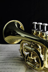 Trumpet with music sheet