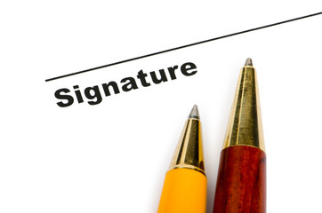 Pen and signature isolated on white