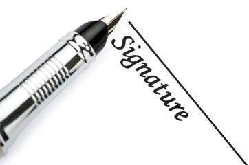 Pen and signature isolated on white