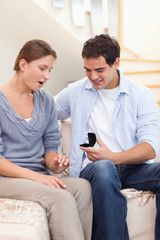 Portrait of a man offering a ring to her girlfriend