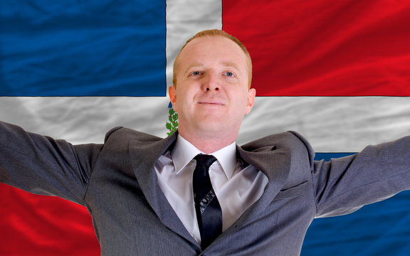 happy businessman because of profitable investment in dominican