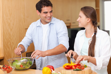 Couple preparing a salad