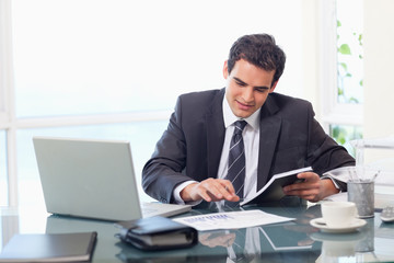 Smiling businessman working