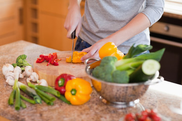 Woman cutting vegetables