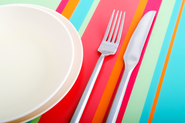 Empty plate with utensils