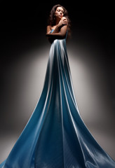 beautiful brunette in long dress