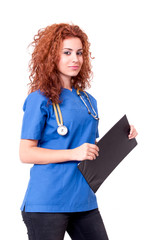 Female doctor holding clipboard and smiling
