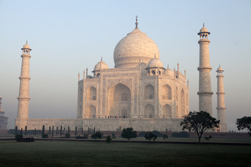 Taj Mahal in Agra with a slightly pink colour during sunrise