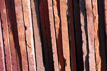 Background from paving stones, rectangular stones in red shades