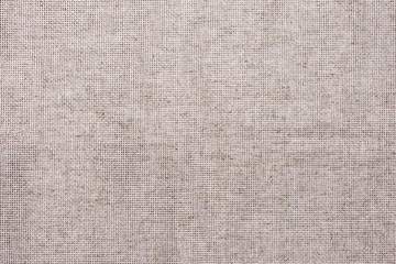 Fototapeta premium Gray linen cloth canvas background, copy space design ready