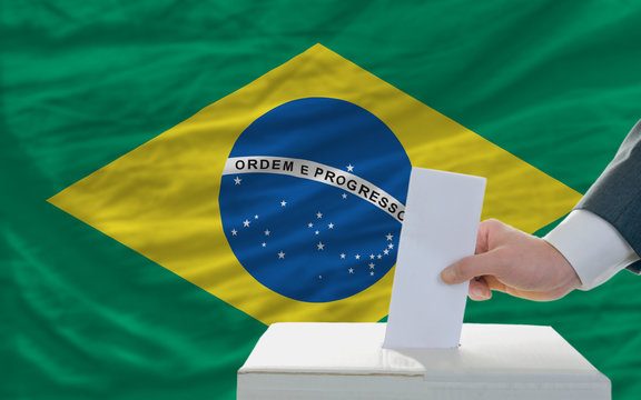 man voting on elections in brazil