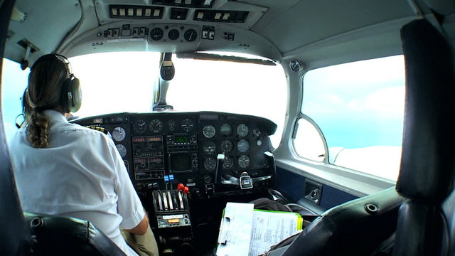 Pilot in Cockpit of Light Aircraft