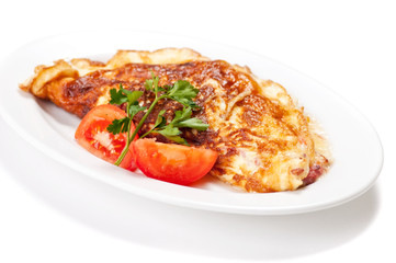 Omelet with herbs and tomatoes