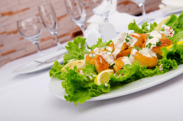 Ceasar salad served in the plate