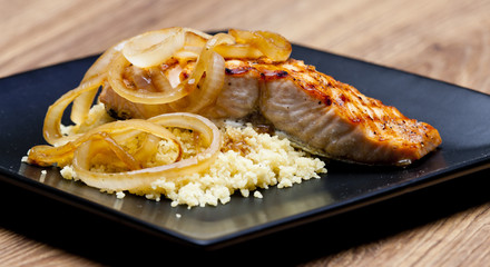 grilled salmon with burned onion and couscous