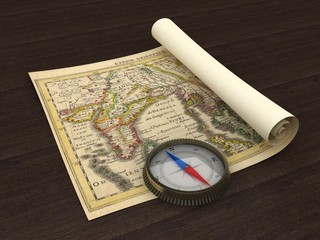 Old Map and Compass on the table