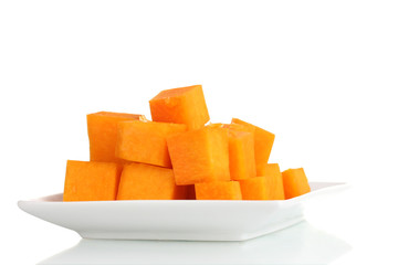sliced pumpkin on plate isolated on white