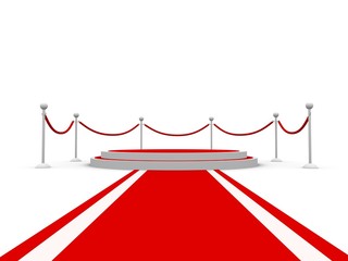 Round pedestal with barriers and red carpet towards camera
