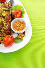 Lamb leg served in the plate