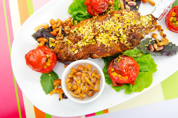 Lamb leg served in the plate