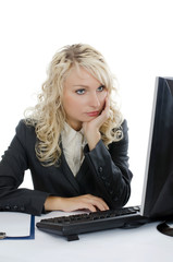 The young girl behind the computer