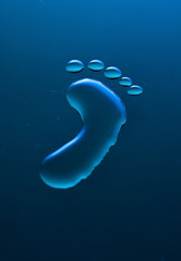 Footprint out of water on blue surface - 37237256
