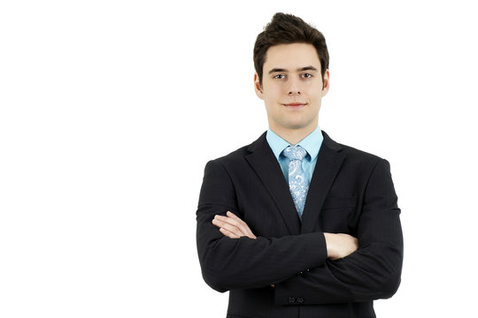 Young business man arms crossed