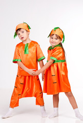 Cute kids in carrot fancy dress