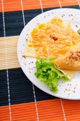 Pumpkin stuffed panckes in the plate