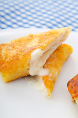 Custard filled pancake in plate