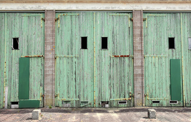 Large doors of garage for military vehicles