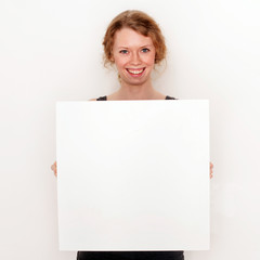 Fototapeta premium Mädchen mit Schild