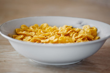 bowl of  corn flakes on the table