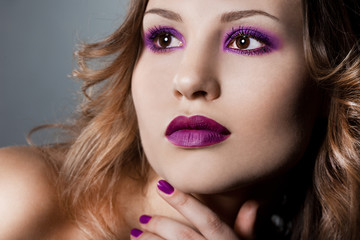Fototapeta premium elegant fashionable woman with violet visage