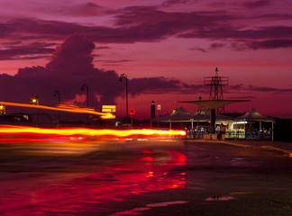 Old Havana at sunset with light trails from passing cars a