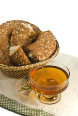 bun in a wicker basket and golden honey