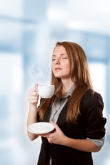 Businesswoman to inhale aroma coffee