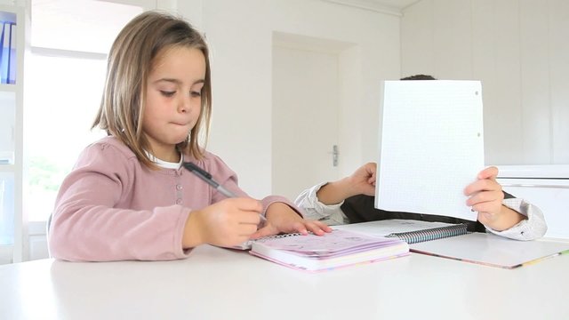 Kids doing drawings at home