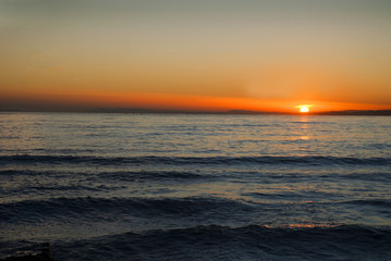 Sunset over beach at Marbella on Costa del Sol Spain