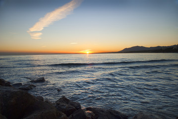Sunset over beach at Marbella on Costa del Sol Spain