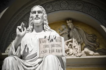 Photo sur Plexiglas Monument historique Jesus statue with the quote book