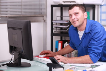 factory worker in his office