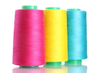 Bobbins of thread isolated on white
