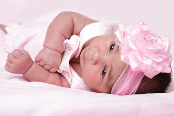 Fototapeta na wymiar Baby girl in pink
