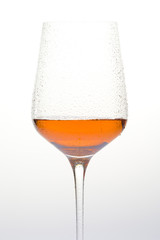 wineglass with rosé wine