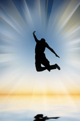 Fototapeta na wymiar jumping young man