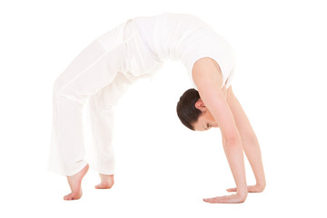 Young woman doing yoga exercise